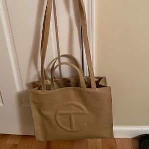 Medium cream Telfar shopping bag. Gently used Includes dustbag, tags plastic bag